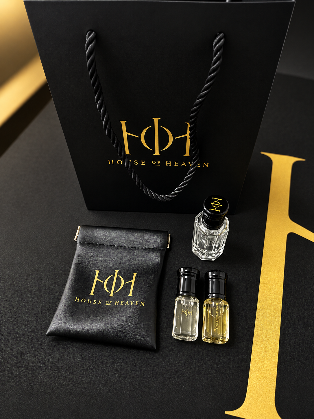 Any 2 × 12ml Bundle House of Heaven fragrance bundle with premium pouch and bag