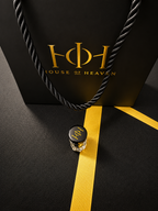 Vanilla & Cinnamon House of Heaven fragrance oil bottle with black and gold branded bag